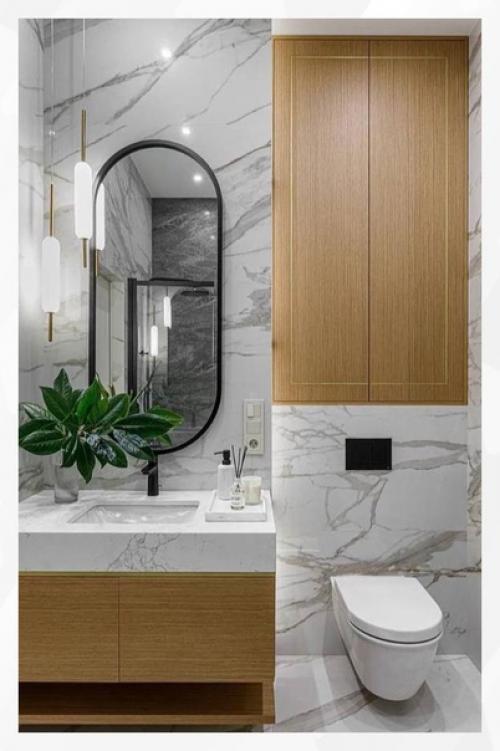 На небольшом пространстве дизайнеру удалось разместить гостиную с открытой кухней, спальню, а также ванную комнату. 06