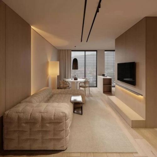 Гостиная переходящая в кухню в светлых тонах. 02