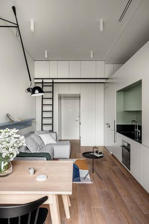 Цветовая гамма квартиры сдержанная: белые стены хорошо сочетаются с пастельными оттенками элементов интерьера. 04