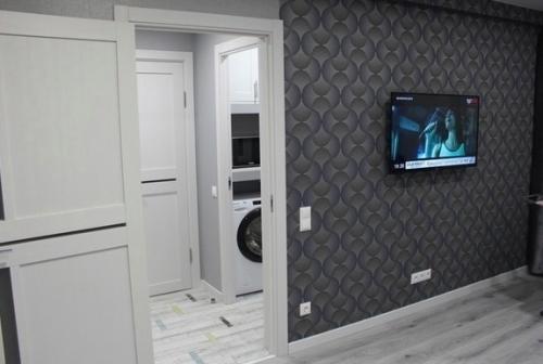 Наша команда превосходных дизайнеров потрясающий интерьер для квартиры создала. 06