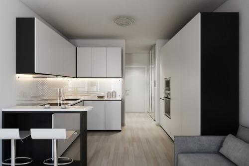 А тут более практичный вариант дизайна студии, 32 кв. 02