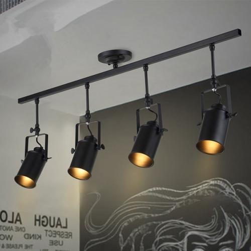 Трековые светильники с натяжным потолком - оригинальная организация освещения. 03