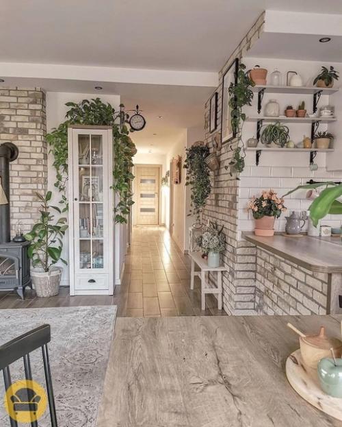 Уютная и просторная квартире с преобладающим в неё стилем лофт. 04