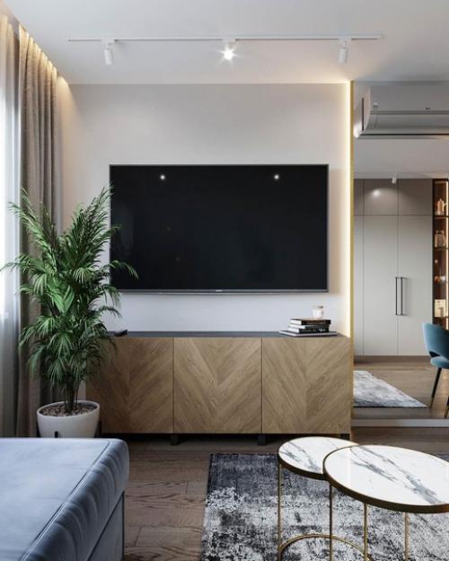 Кухня - гостиная.  Крутое сочетание цветов и мебели, удачным дополнением данного интерьера стал диван в синем цвете. 07