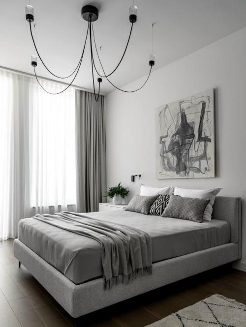 Минималистичная и лаконичная, эта квартира - пример того, как даже монохром может быть выразительным. 04