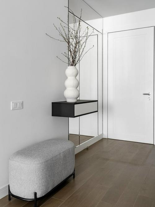 Минималистичная и лаконичная, эта квартира - пример того, как даже монохром может быть выразительным. 05