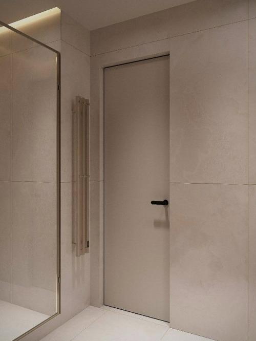 Интерьер ванной, где сочетаются светлые и темные оттенки. 02