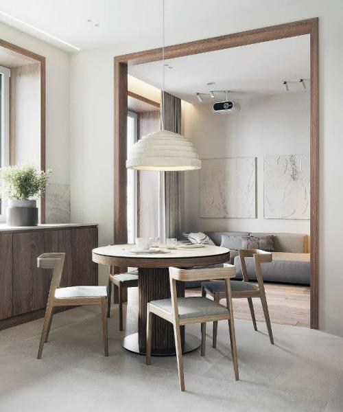 Интерьер кухни гостиной от Ольги мудряковой впечатляет своей светлой и лаконичной концепцией. 05