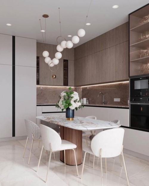 Интерьер кухни - гостиной в неоклассике с преобладанием светлых оттенков. 01