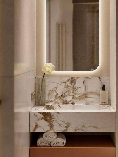 Интерьер ванной, где сочетаются светлые и темные оттенки. 05