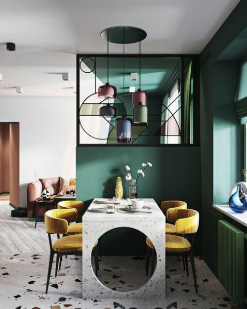 Стильный, колоритный интерьер кухни - гостиной с повторяющимися кругами и геометрическими формами. 06