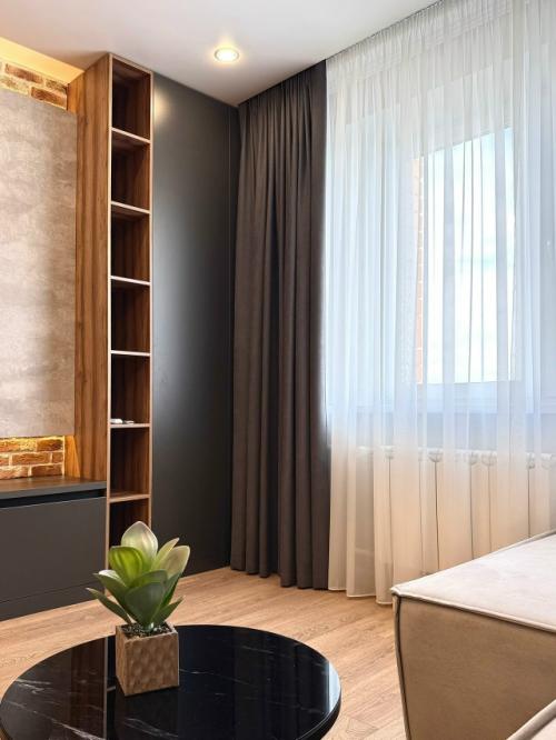 Как спрятать кухню в общем пространстве, чтобы она не перетягивала внимание на себя? 09 Как спрятать кухню в общем пространстве, чтобы она не перетягивала внимание на себя? 09