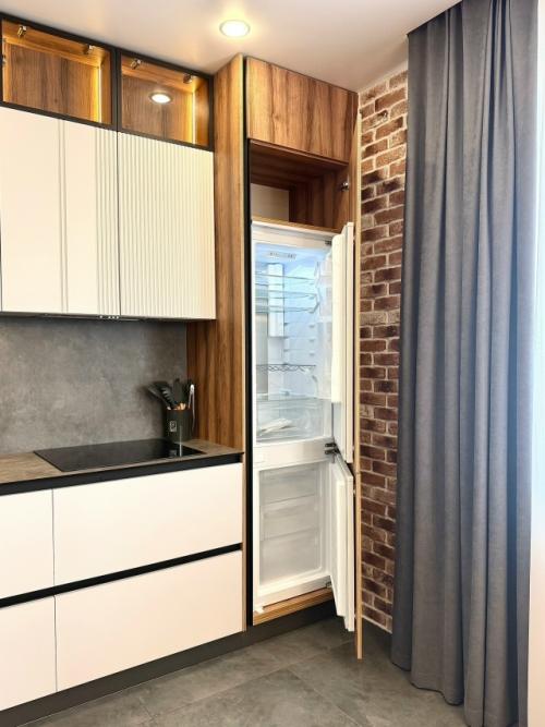 Как спрятать кухню в общем пространстве, чтобы она не перетягивала внимание на себя? 05 Как спрятать кухню в общем пространстве, чтобы она не перетягивала внимание на себя? 05