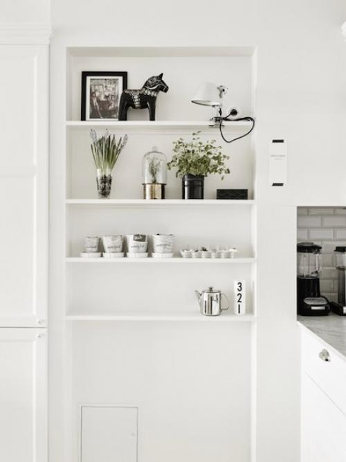 Интерьер этой шведской квартиры в лучших традициях скандинавского стиля выдержан. 03