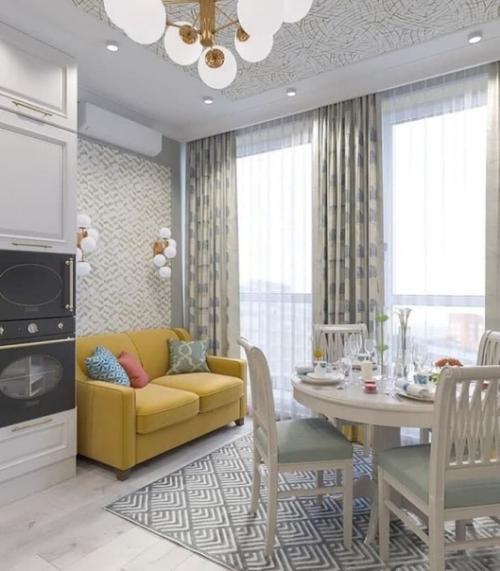 Желтый диван - это яркий акцентный элемент кухни - гостиной, который задает настроение всему интерьеру. 05