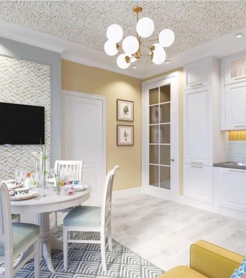 Желтый диван - это яркий акцентный элемент кухни - гостиной, который задает настроение всему интерьеру. 03