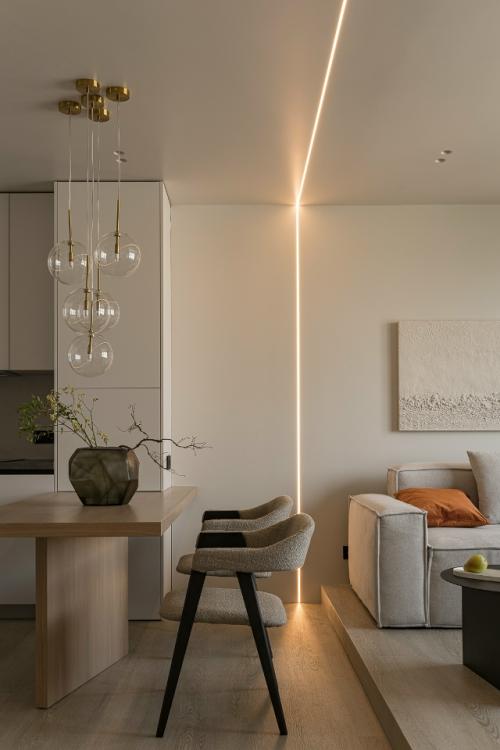 Кухня гостиная в этом проекте была увеличена за счёт присоединённой лоджии на 5, 5 кв м. в подиум спрятано утепление и встроен теплый пол. 04