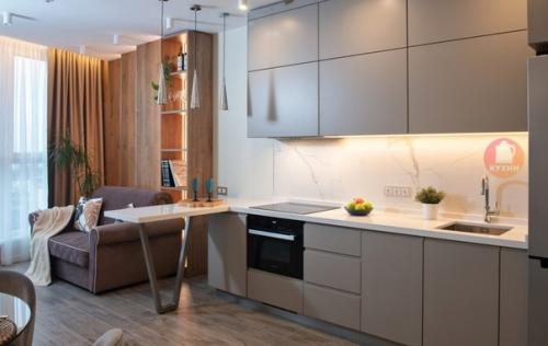 Современный, лаконичный интерьер кухни - гостиной, разработанный дизайнером Еленой Кулешовой. 03