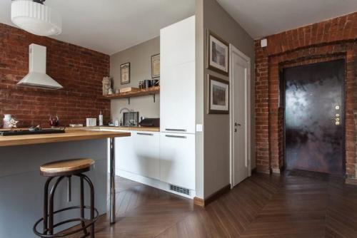 Лофт гармонично объединит техническую зону кухни с общим пространством гостиной. 06