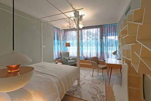 Проектная фирма Open AD - Architecture and Design оформила интерьер апартаментов ST в Юрмале, Латвия. 09