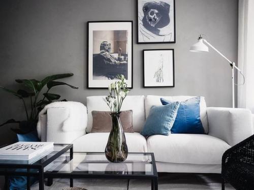 В оформлении квартиры используются темно-серые оттенки с небольшими вкраплениями белого цвета. 03