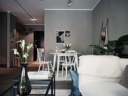 В оформлении квартиры используются темно-серые оттенки с небольшими вкраплениями белого цвета. 02