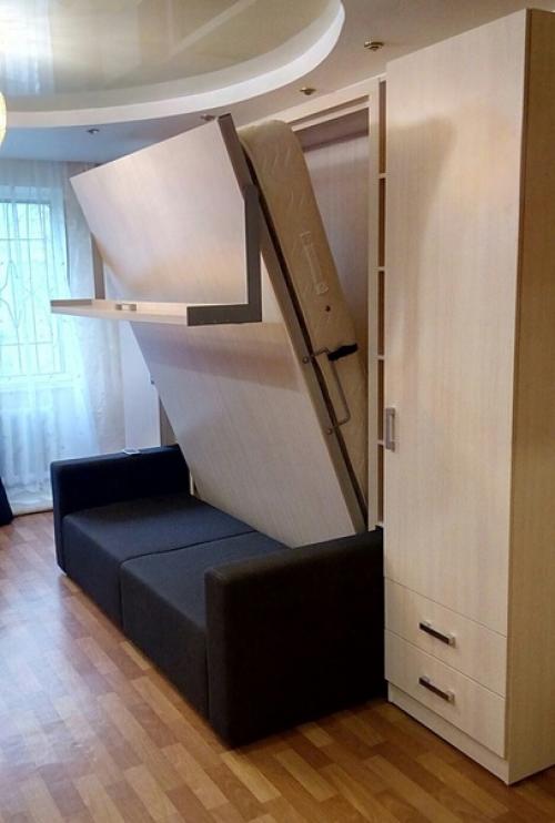 Днём у вас большая гостиная, а ночью - уютная спальня с полноценной кроватью. 08