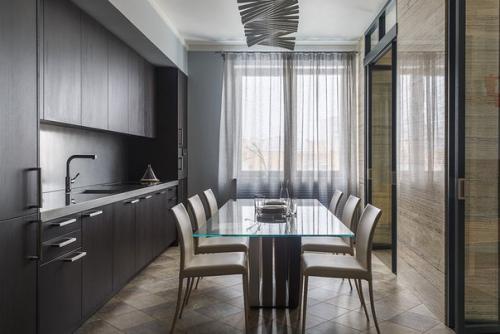 Сдержанный, лаконичный и в тоже время очень функциональный интерьер представлен на этих 115 кв. 03