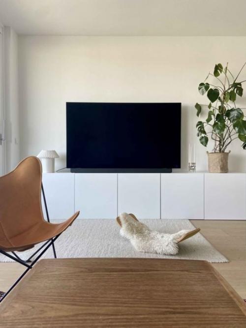 Светлый дизайн интерьера с мебелью Ikea и тёплыми акцентами. 03