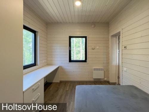 А вот и интерьеры растущего дома, который мы показали вам в предыдущей публикации. 05