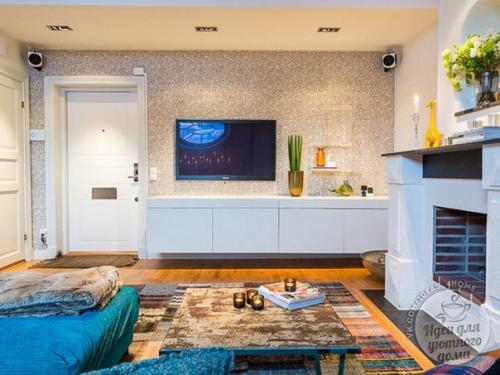 Небольшой лофт в два этажа с камином и французским балконом. 05