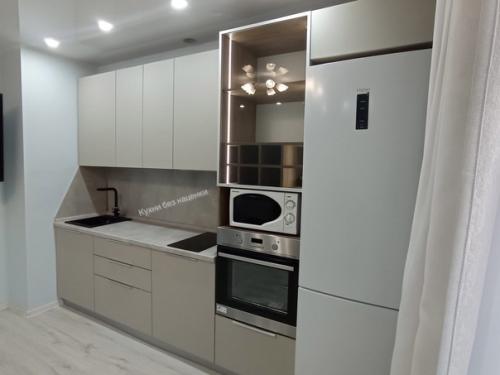 Бежевые тона - ещё один классический вариант для кухни. 03