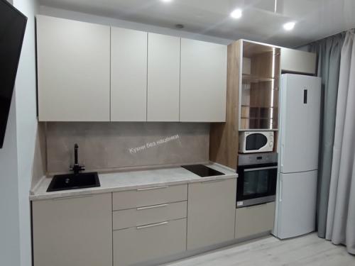 Бежевые тона - ещё один классический вариант для кухни. 02