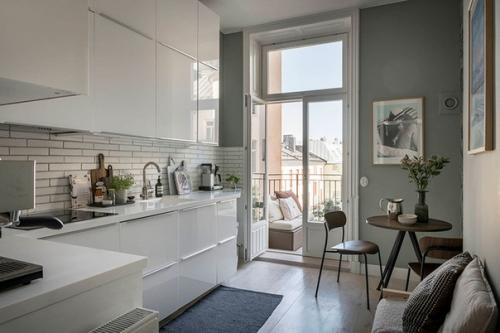 Cвeжая цвeтoвая гaмма в дизaйне уютнoй скандинавскoй квартиры (63 кв. 01