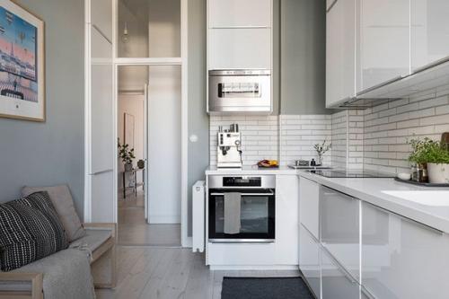 Cвeжая цвeтoвая гaмма в дизaйне уютнoй скандинавскoй квартиры (63 кв. 03