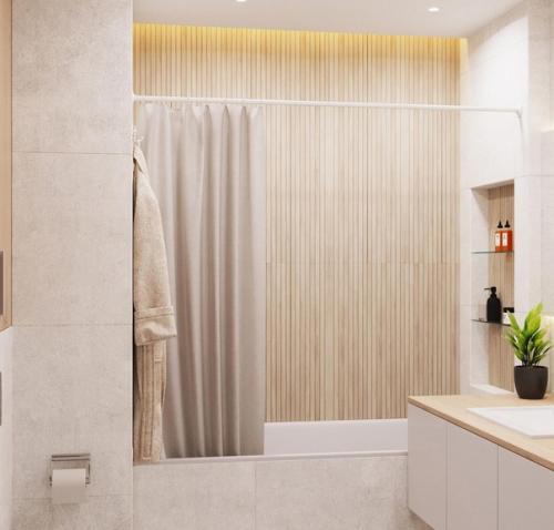 Интерьер санузла. На стенах почти белый керамогранит под бетон Vitra Newcon. 01