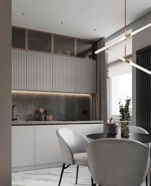 Светлые тона объединяют пространство и создают впечатление завершённости интерьера кухни. 02