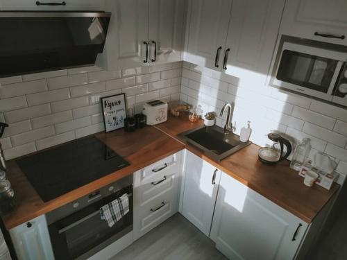 Скандинавский интерьер кухни - это прежде всего гармония. 02