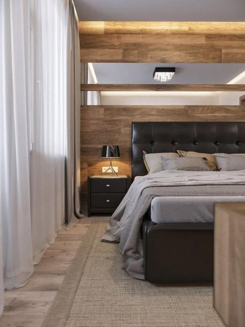 Массивная мебель, коричнево - бежевые тона и тяжелые шторы создают ощущение спокойствия и защищенности. 01