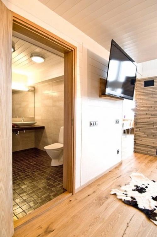 Минималистический, скандинавский интерьер двухуровневой квартиры в Швеции. 07