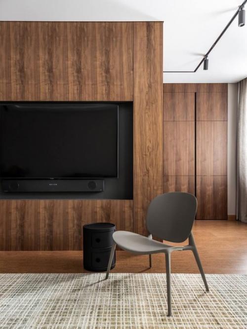 Лаконичный интерьер квартиры за счет большой площади воплотили все свои мечты. 03