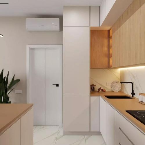 В интерьере этой уютной кухни - гостиной сплелись воедино тепло натурального дерева и прохлада мрамора. 04