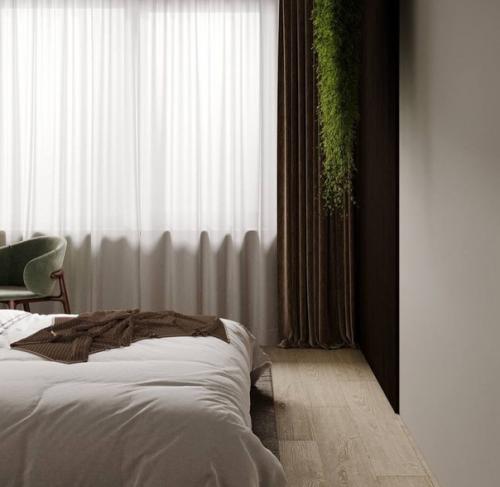 Интерьер просторной квартиры в спокойных нежных тонах выполнен. 05