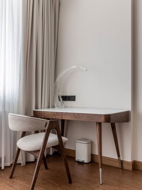 Лаконичный интерьер квартиры за счет большой площади воплотили все свои мечты. 08