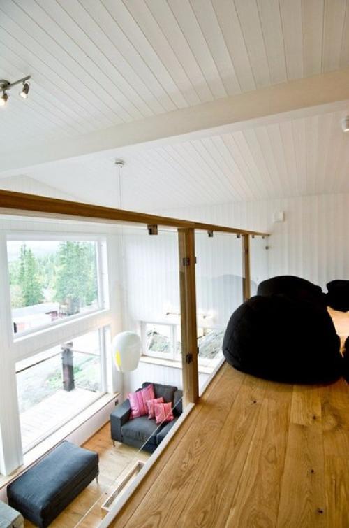 Минималистический, скандинавский интерьер двухуровневой квартиры в Швеции. 01