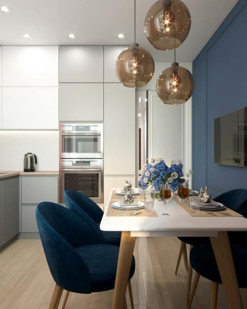 Холодильник на момент проектирования интерьера присутствовал в квартире, и решили сделать его цветовым акцентом для кухни. 02