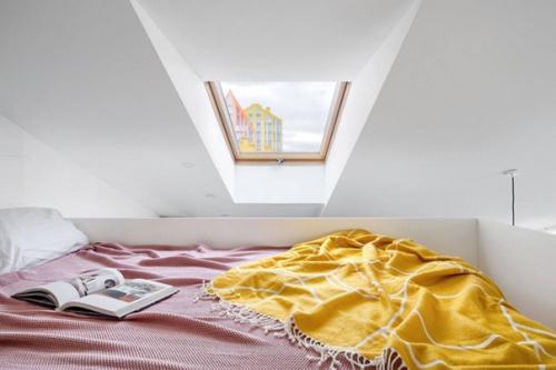 Небольшая мансардная квартира с антресолью. 06