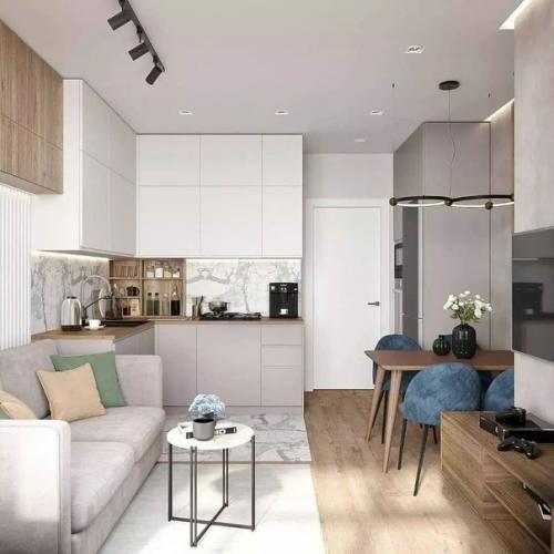 Лаконичная стильная уютная, вот что приходит на ум, когда смотрю на фото интерьера этой кухни - гостиной. 02