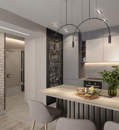 Современный монохромный интерьер кухни - гостиной в квартире для молодой семейной пары. 02