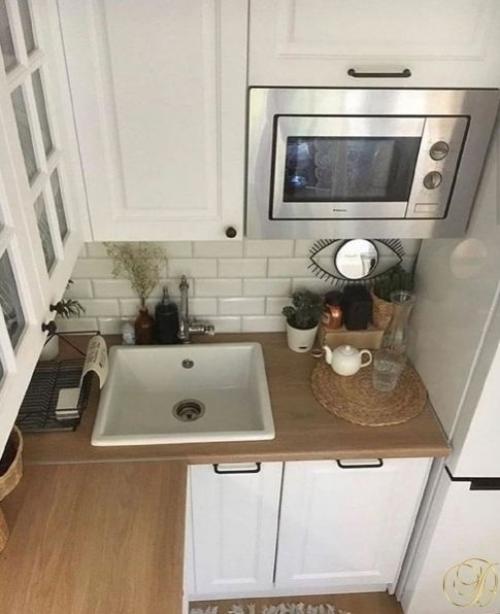 Очень красивая и уютная кухня в скандинавском стиле в типовой планировке. 03